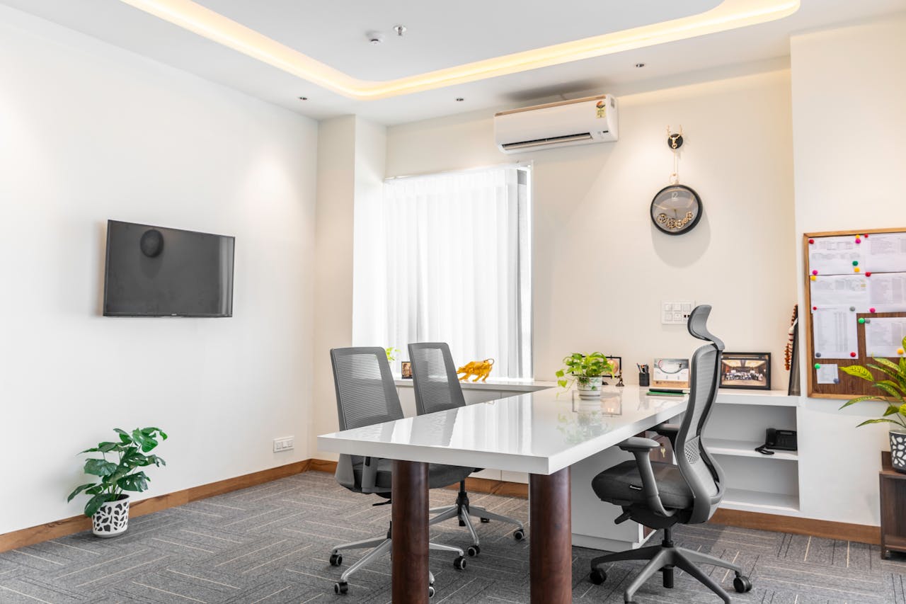 Modern office space with sleek furnishings and natural light in Punjab, India.